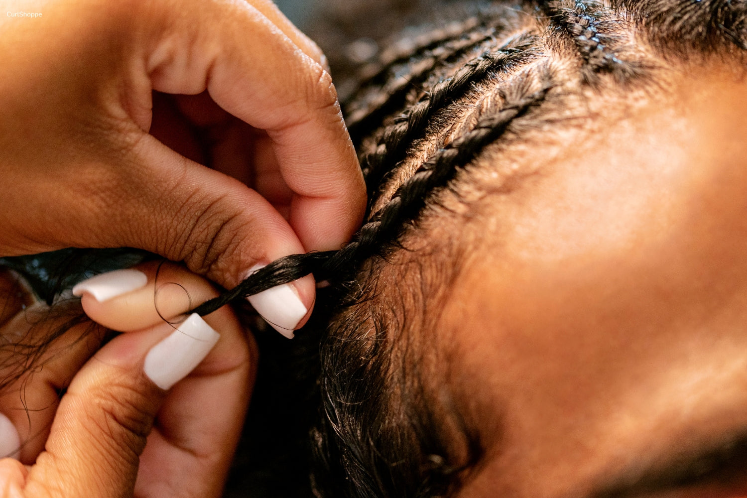 cornrow braiding hair